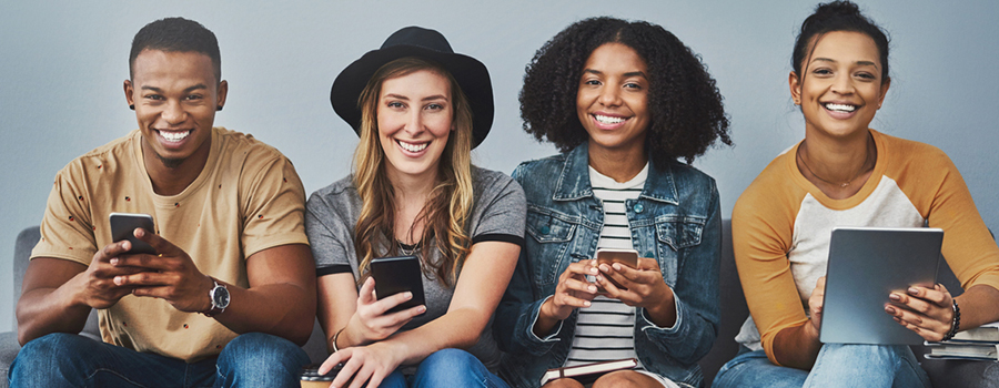 A group of Gen Z consumers sitting on a couch