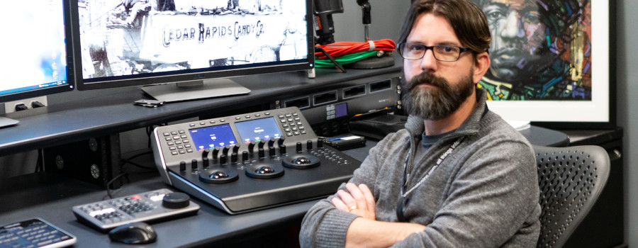 Informatics Media Director Chris Gray in the video editing studio