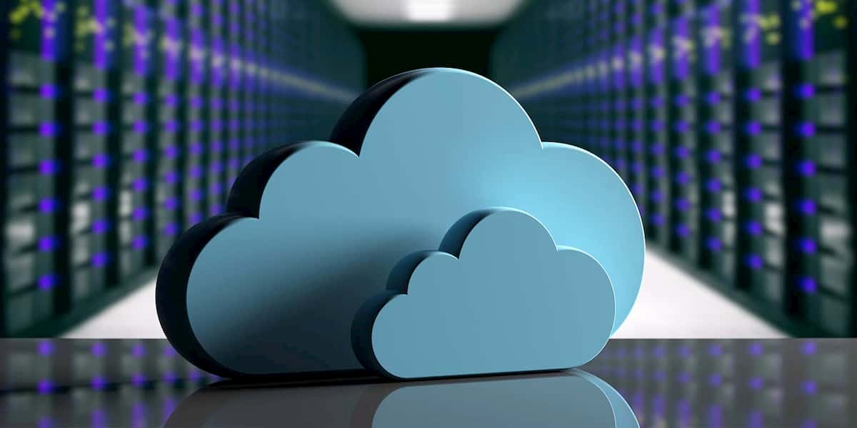 A 3D cloud element is positioned in front of a row of servers