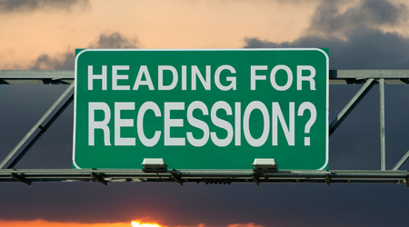 A road sign asking if an economic recession is ahead