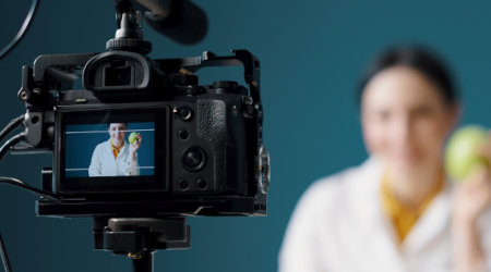 Healthcare professional in front of a camera. 