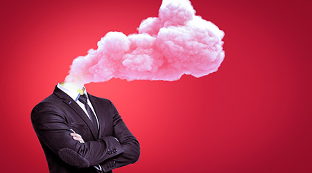Headless businessman among the cloud