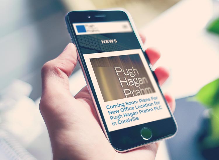 Pugh Hagan Prahm responsive site on mobile phone
