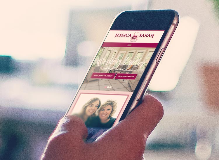 The Jessica and Sarah website appears on a mobile phone