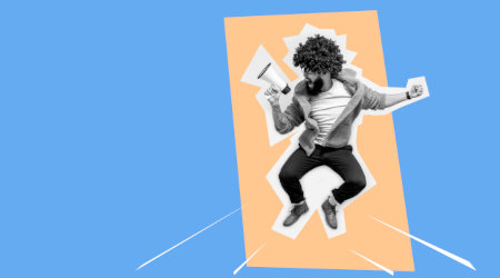 A marketer jumps for joy while thinking about paid ads